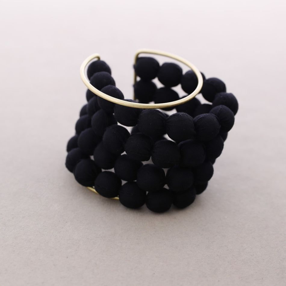 ADJUSTABLE BRACELET WITH COATED BALLS