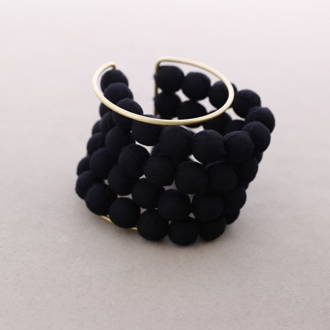 ADJUSTABLE BRACELET WITH COATED BALLS