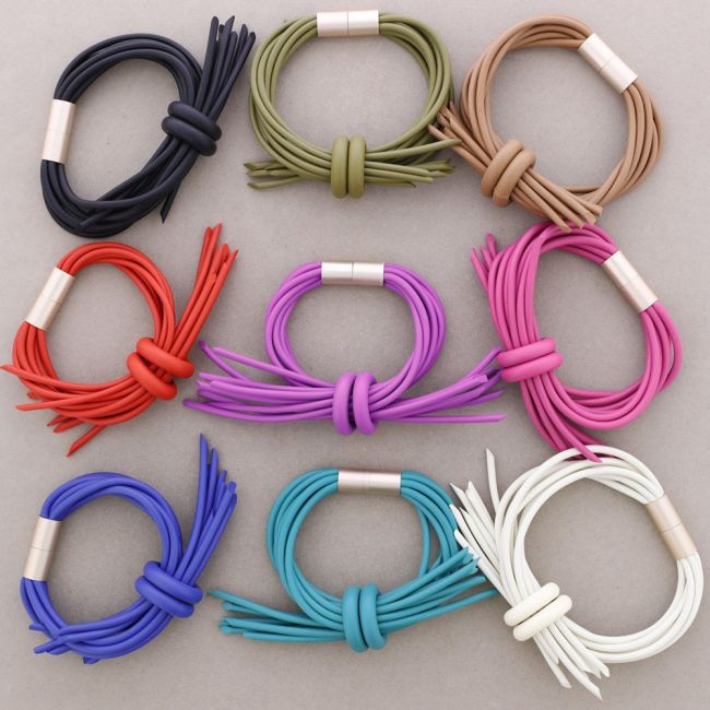 PULSERA IMÁN GOMA CRUZADA