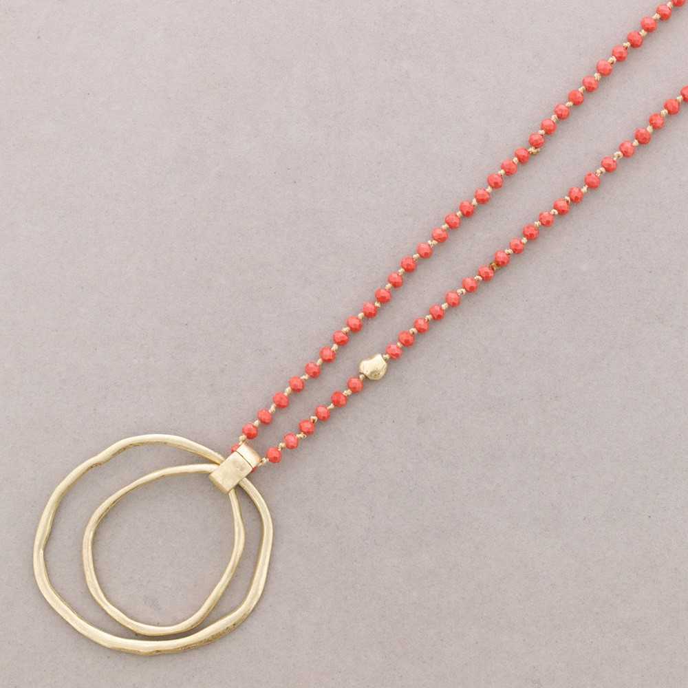 LONG NECKLACE WITH FACETED CRYSTALS, DOUBLE HOOP METAL PENDANT