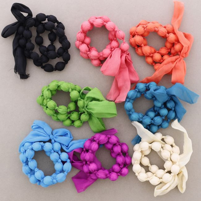 PULSERA TRIPLE BOLAS FORRADAS TELA