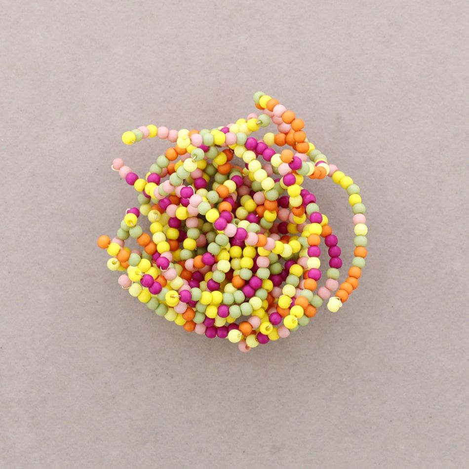BROCHE FLOR FLEXIBLE CUENTAS RESINA
