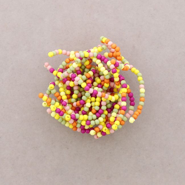BROCHE FLOR FLEXIBLE CUENTAS RESINA