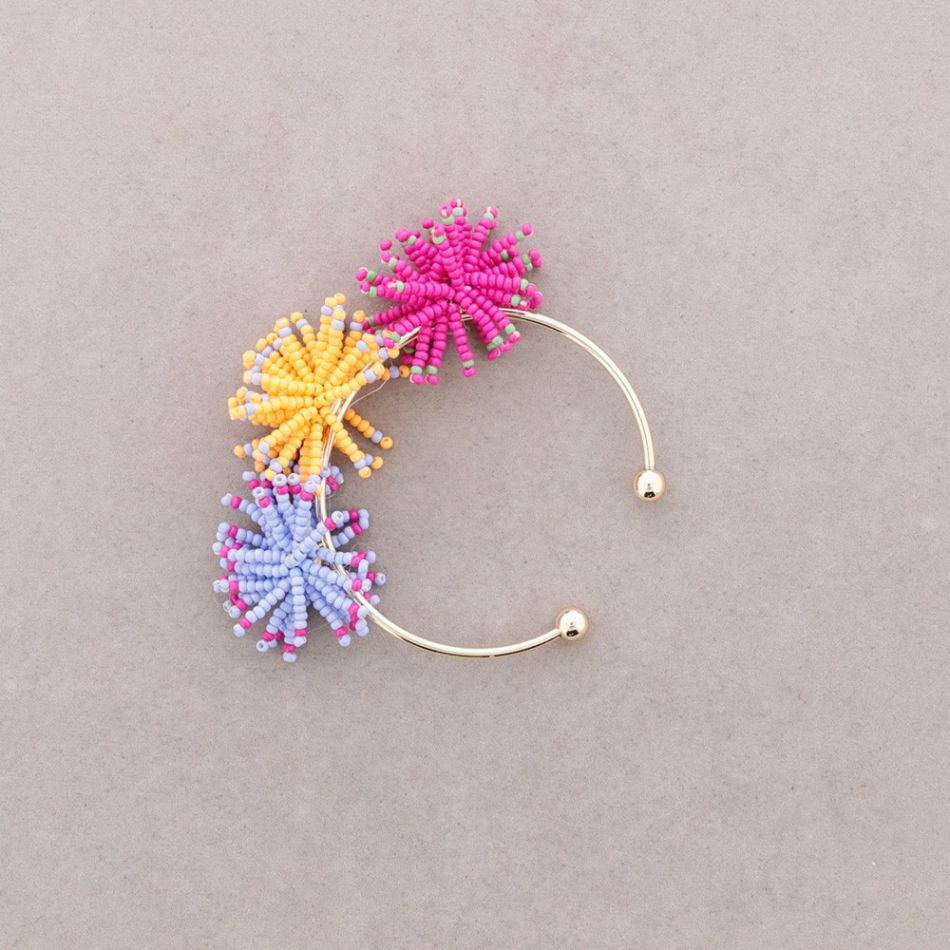 RIGID BRACELET WITH POMPOMS AND BEADS