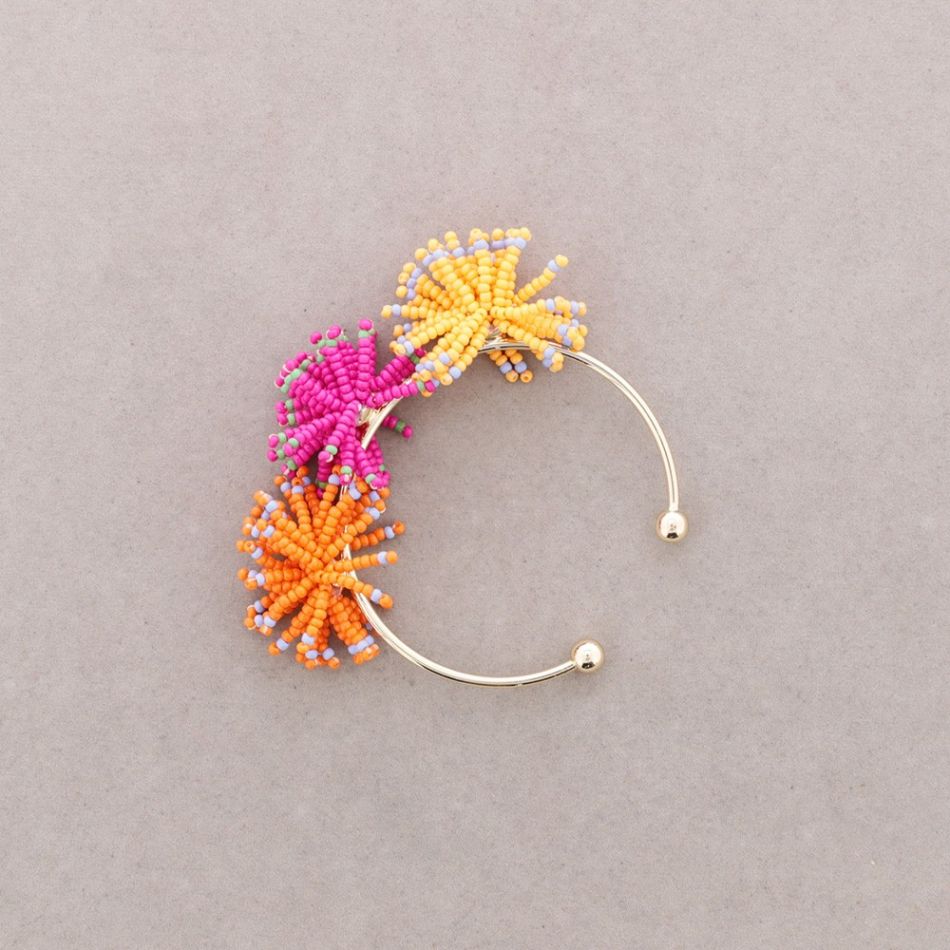 RIGID BRACELET WITH POMPOMS AND BEADS