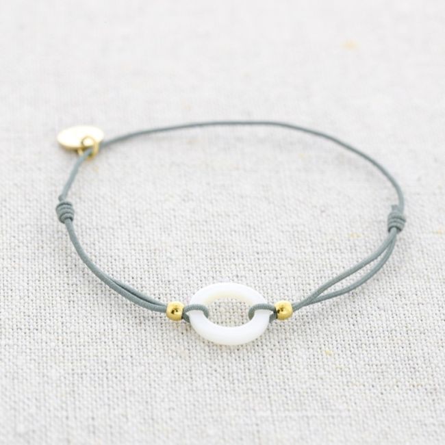 PULSERA ELÁSTICA ACERO ANILLA  NÁCAR