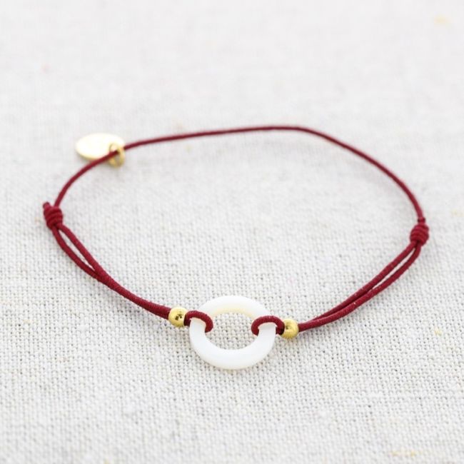 PULSERA ELÁSTICA ACERO ANILLA  NÁCAR