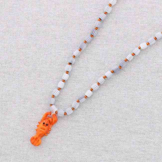 STEEL NECKLACE WITH CRYSTALS PENDANT