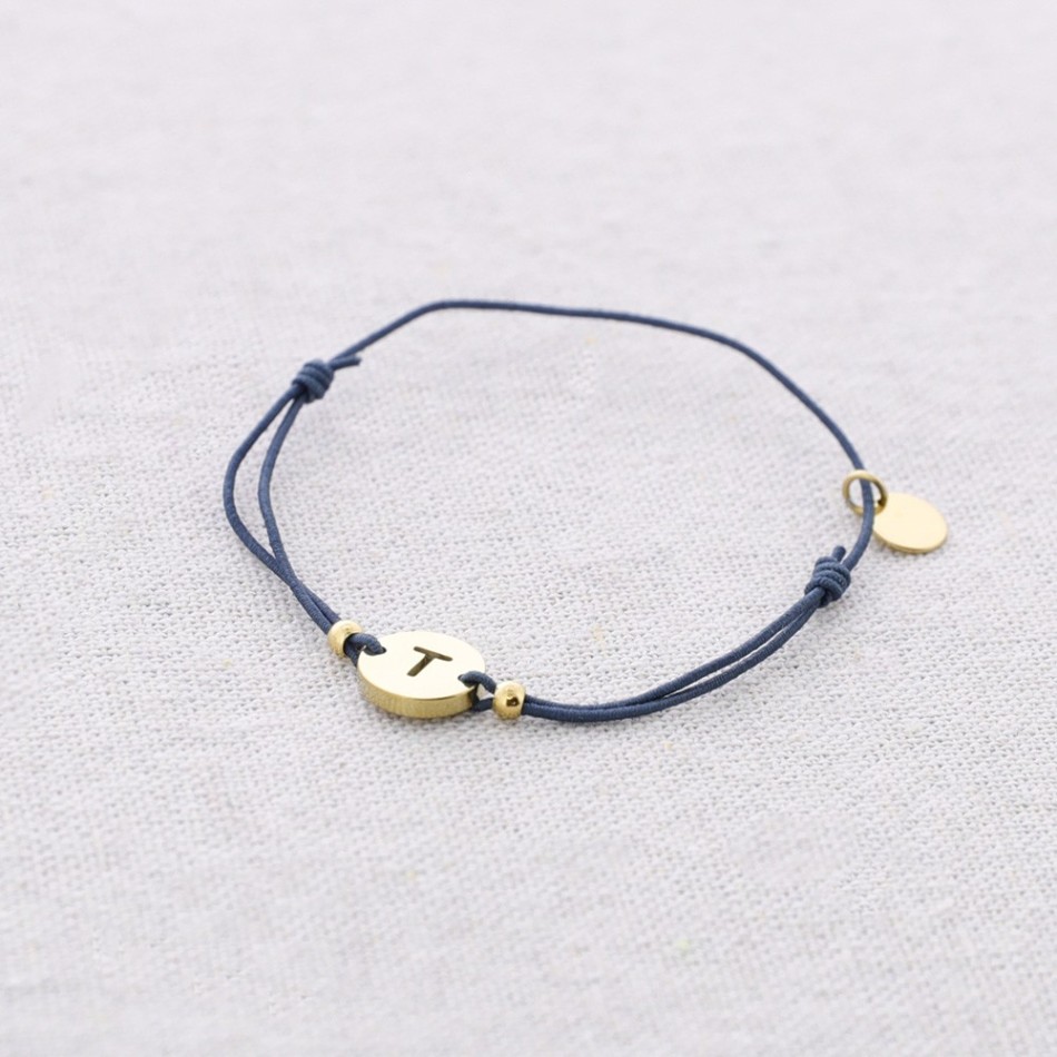 PULSERA ELÁSTICA ACERO LETRA T