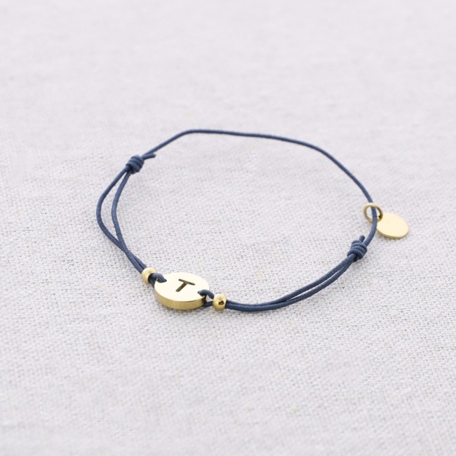 PULSERA ELÁSTICA ACERO LETRA T